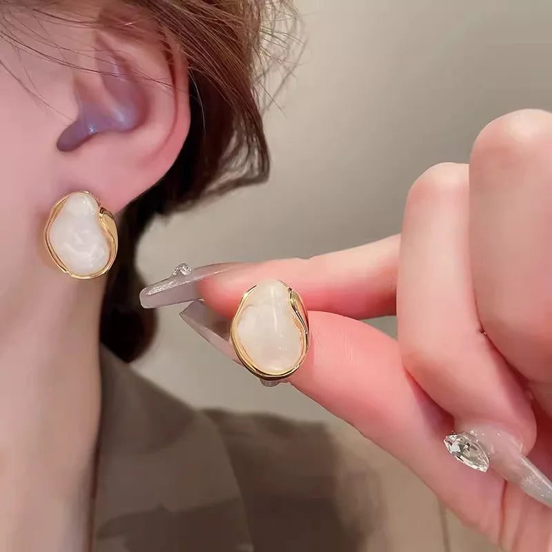 Amber Geometric Stud Earrings for Women